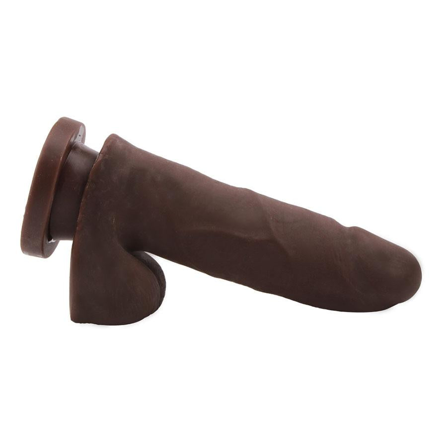 Realistic brown dildo with lifelike texture and realistic glans for pleasure