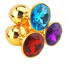  Elegant and opulent anal toy in gold with sparkling jewel base