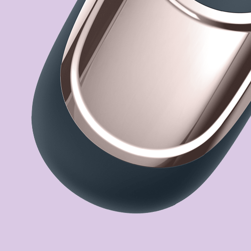 Woman holding Satisfyer Layons Dark Desire vibrator, a waterproof and rechargeable sex toy for solo or couple play