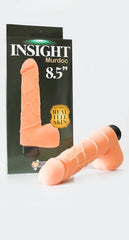  Woman holding the Vibrador Murdock with a satisfied expression on her face
