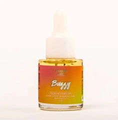  Image of the BUZZY MULTIORGASMICO vibrator being used by a woman in a comfortable setting