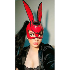 Black face mask with white Bad Bunny logo and adjustable straps