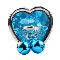 Shiny silver anal plug with dangling chain and gemstone accent