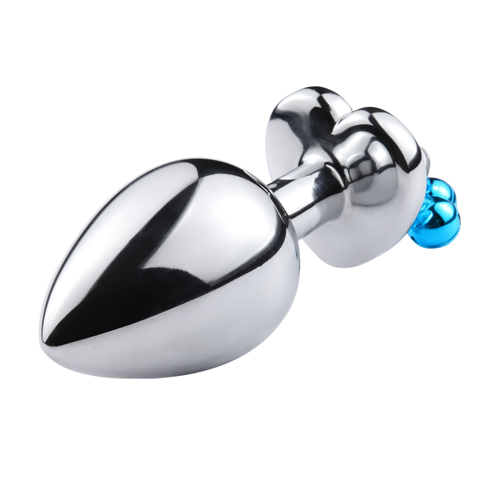 Shiny silver anal toy with decorative chain and jewel for sensual play and excitement